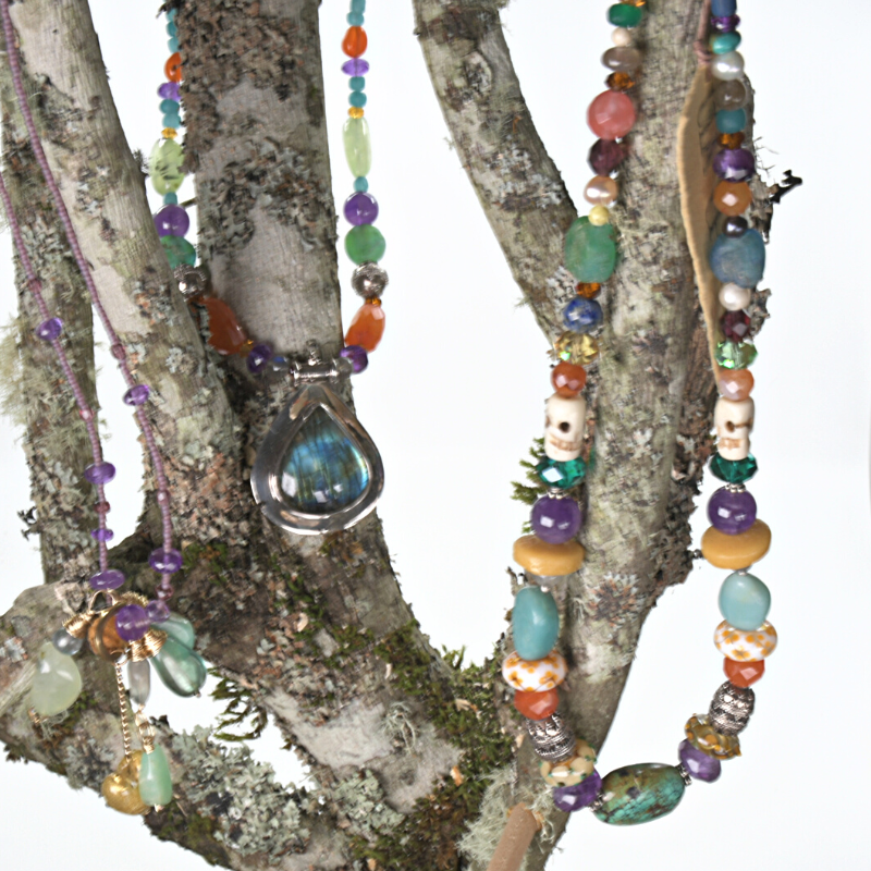Colourful beaded necklaces made with turquoise, amethyst, carnelian, Lapis lazuli, and rose quartz stones, and beads made from bone, crystal, sterling silver, flame-worked and recycled glass. Designed and handcrafted by Ula Frou creator Sadie Hodson on Salt Spring Island.